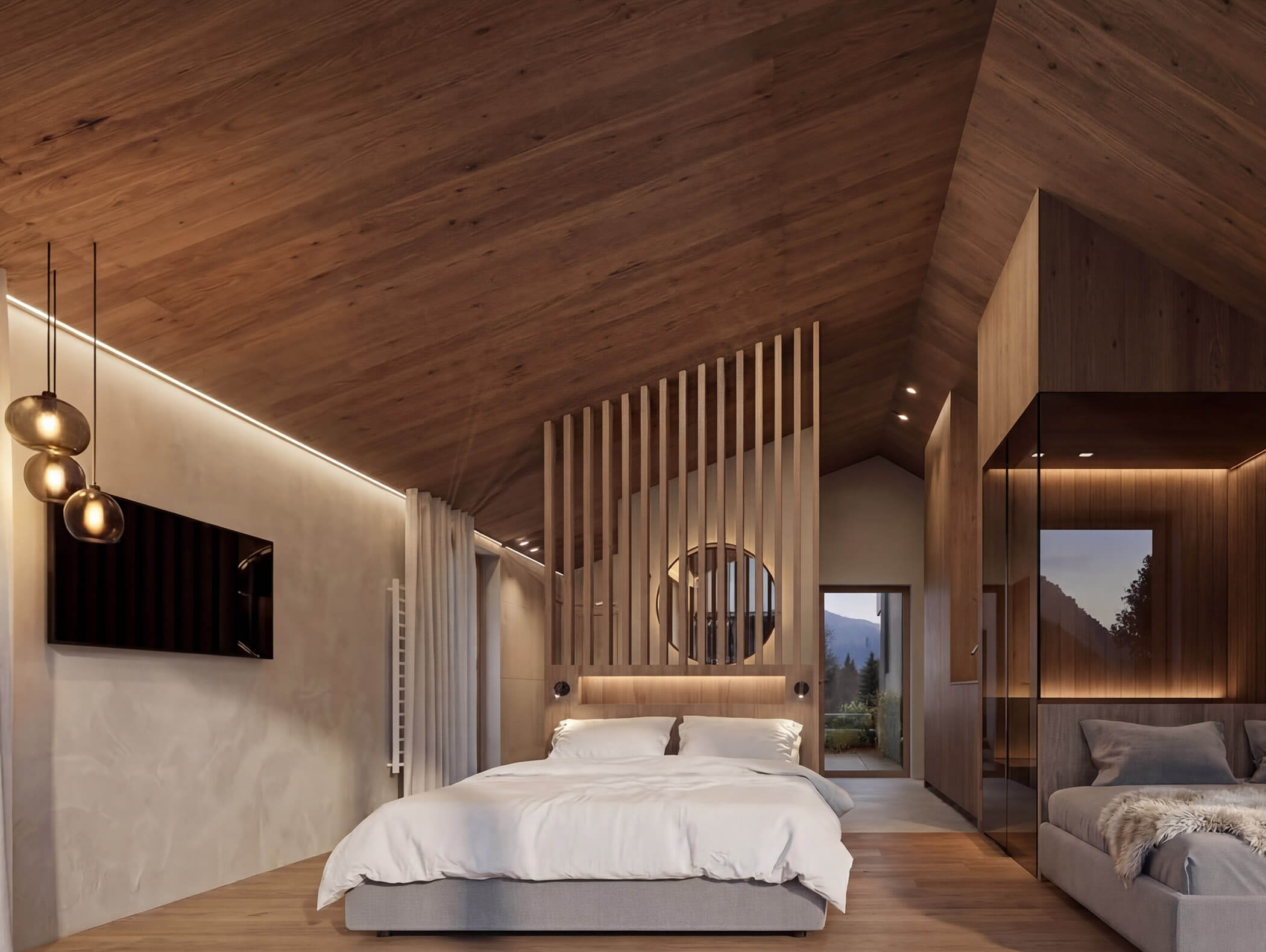 Modernes Schlafzimmer mit schräger Holzdecke, gemütlichem Bett, warmer Beleuchtung und großem Fenster mit Bergblick. - AMIL chalets dolomites